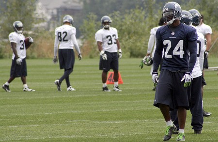 Safety Deon Grant working through a drill at a training camp practice last August.