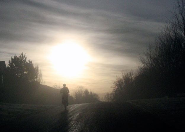 A lone rider cuts through the morning fog Jan. 21 on Renton Hill.