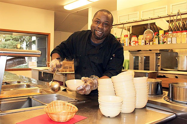 Chef Charles Turner serves up a bowl of his mother’s chili recipe this week at the senior center.
