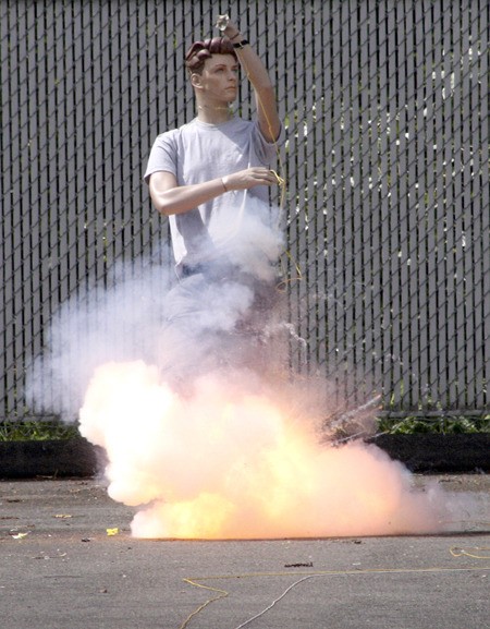 This mannequin is about to lose its feet after an illegal fireworks explodes in a demonstration Friday morning by federal agents at the Renton Fire Department's training facility.