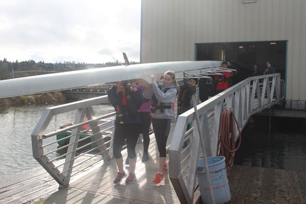 Middle school and high school students of the Renton Rowing Club get ready for practice this week. Saturday marks the beginning of the center’s introduction to rowing.