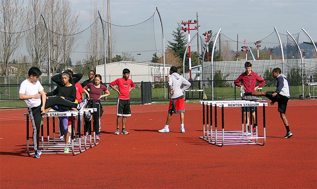 Members of the Renton High School track team take advantage of a sunny afternoon to get in some practice.