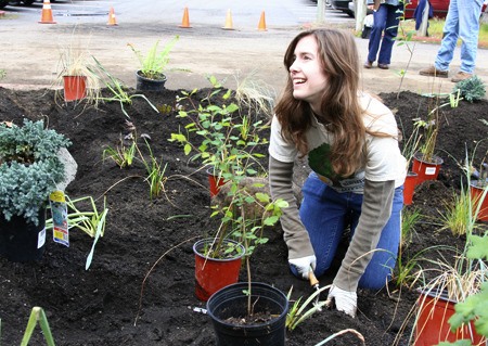 Sophomore Mariah Wallace works on Hazen High School's first rain garden