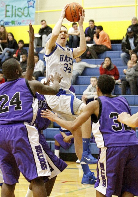 Hazen's Brandt Graybeal goes in for a shot against Foster Feb. 2.