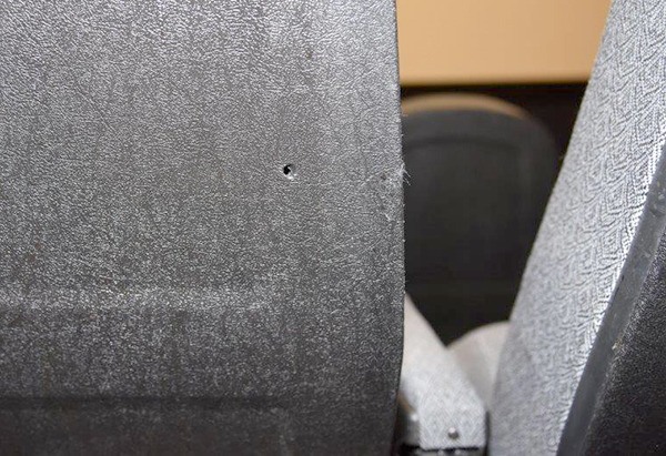 A bullet pierced the back of a seat at the Regal Cinemas at The Landing