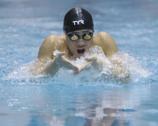 Liberty's Raymond Ha swims at the 3A state meet.
