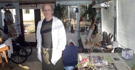 William Leavy stands in his wife Kal's private studio at home on Talbot Hill. Kal