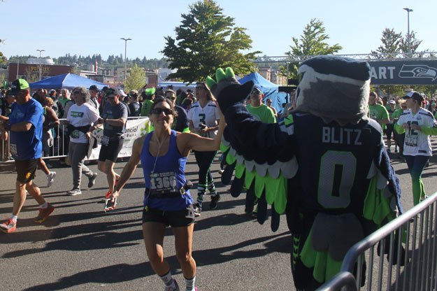 Runners at the Seahawks 12K and 5K races on April 17 got some extra encouragement along the route from Blitz.