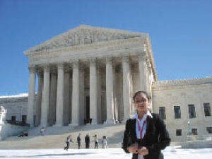 Manpreet Kaur stands in front of the U.S. Supreme Court during a visit to Washington