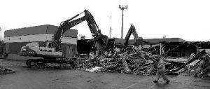 The demolition of the old King County Journal in Kent has begun. A long-time Renton business