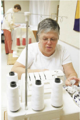 Jeanne Maimon of Seattle finishes edges on a serger  at a recent sewing class at Renton Technical College.