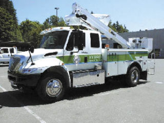 The new City of Renton boom truck runs on both diesel and electric power.
