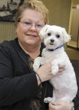 Judy Fountain holding her dog Martini