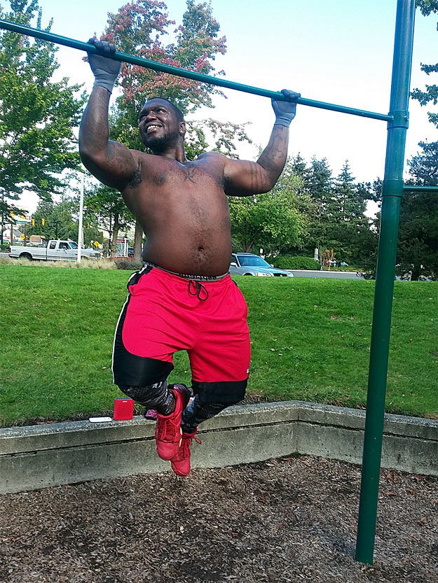 Local man takes advantage of the outdoor exercise park near the Cedar River trail last week.