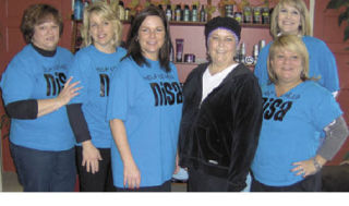 Five hair stylists at the Boulevard Salon on Lake Washington Boulevard volunteered their time for “Cut for a Cure” Sunday to raise funds to help Nisa Shinners with her medical expenses to fight ovarian cancer. They have raised about $5