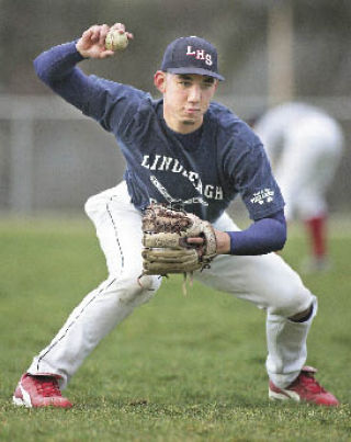 Lindbergh’s Patrick Claussen works on his fielding at practice early in the spring.