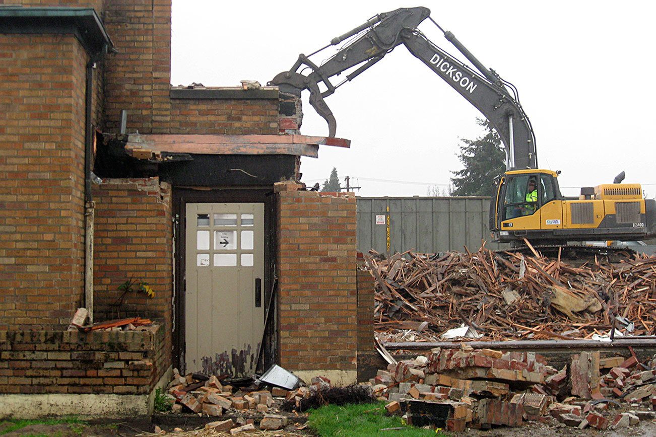 Making way for new school, brick by brick