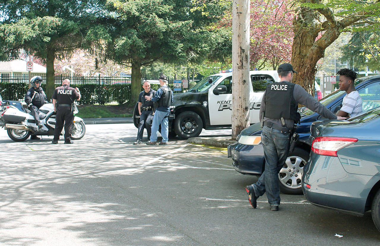 Federal Way and area police respond to a drive-by shooting that left two men injured at the corner of Pacific Highway South and South 288th Street on May 4. The shooting is thought to be gang related. RAECHEL DAWSON, the Mirror