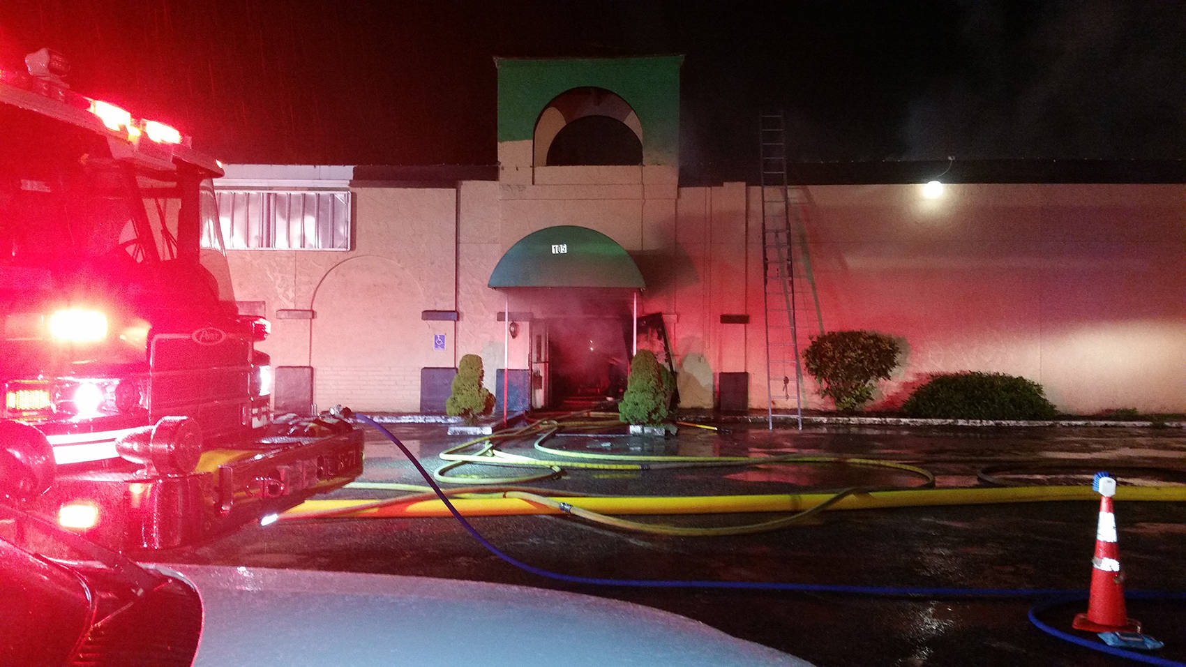 Smoke billows from the entrance of a Kent restaurant late Monday. The resatuarant was empty at the time of the fire. COURTESY PHOTO, Puget Sound Regional Fire Authority