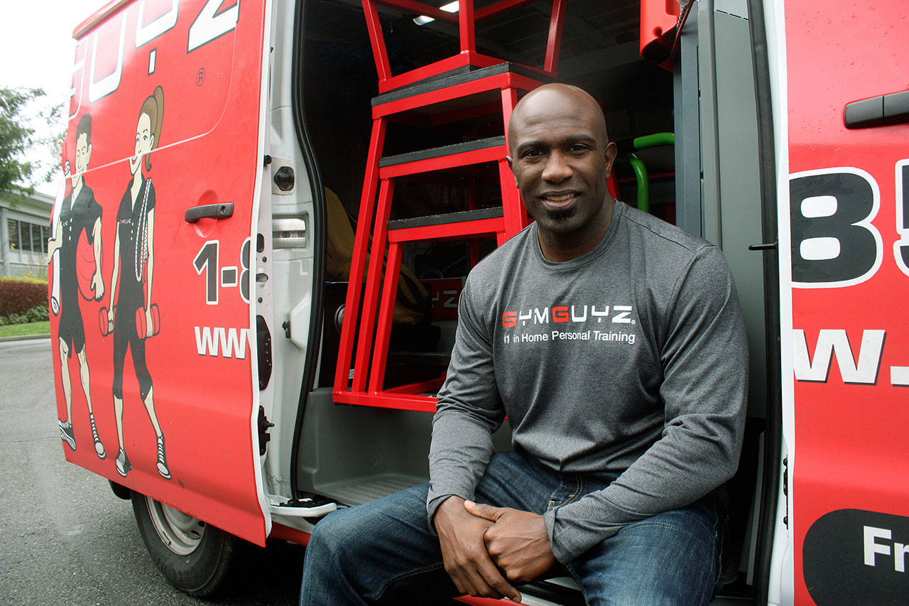 Stacy Edwards runs the GYMGUYZ, a mobile personal training company that brings equipment, trainers and workouts to homes and businesses in the local area. MARK KLAAS, Auburn Reporter