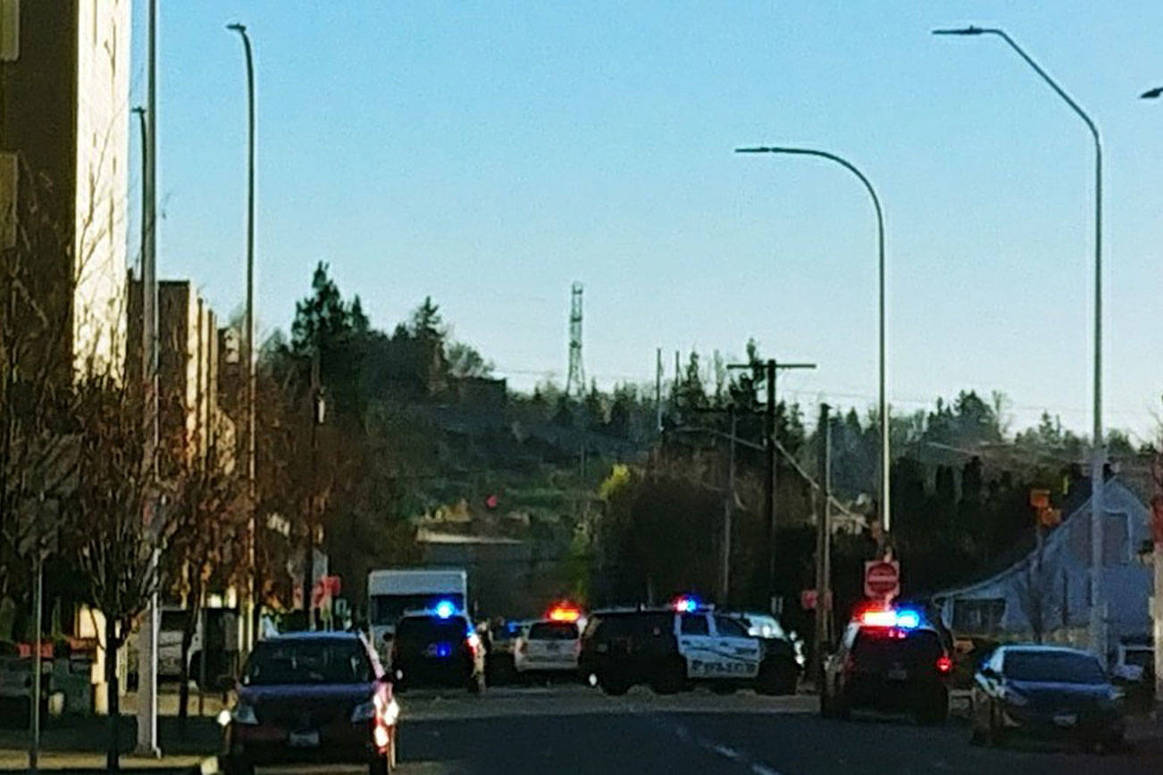 Renton downtown buzzed with police activity Wednesday afternoon after police observed two suspects steal a vehicle. (Photo courtesy Jody Collins)