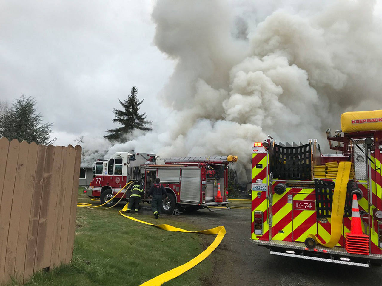Renton Regional Fire Authority and Puget Sound Regional Fire Authority battled a Kent house fire on March 5. Two people were displaced. (Courtesy photos)