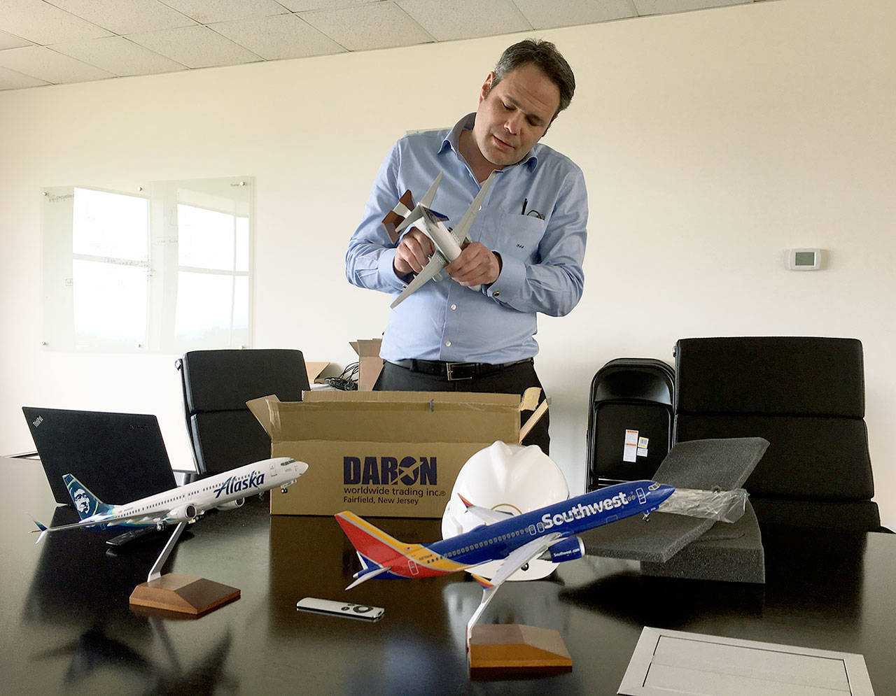 Brett Smith, CEO of Propeller Airports, at the company’s Paine Field office in Everett. (Janice Podsada / The Herald)