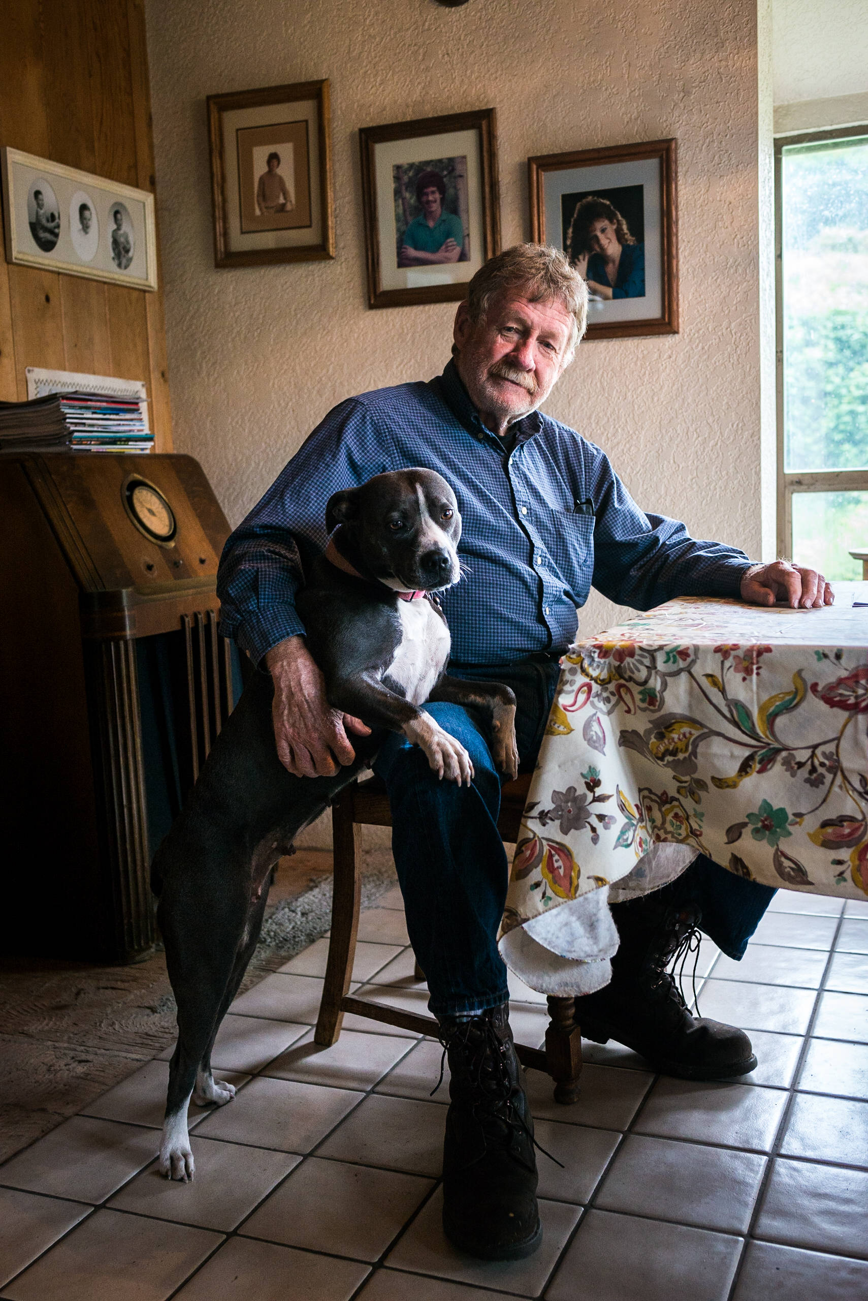 Charles Pillon and his trusty dog Chiba at his residence east of Renton. Photo by Caean Couto