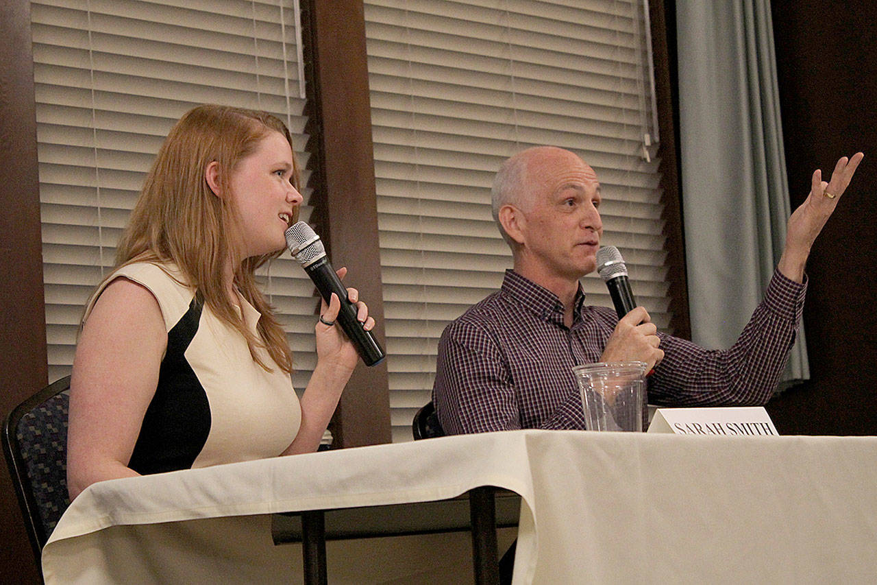 Democratic incumbent Rep. Adam Smith of Washington’s 9th Congressional District (right) and challenger Sarah Smith discuss the issues facing the district during a forum the Mirror hosted on Sept. 19. Andy Hobbs/staff photo