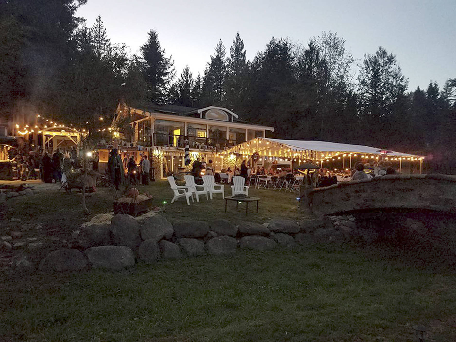 Photo courtesy of Heather Conti.                                 The Whit’s End Harvest Festival lights up the night as attendees of the Lord of the Rings themed event eat and be merry.