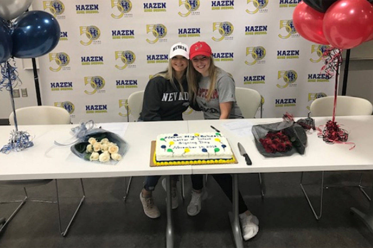 Photo courtesy Ken Matthews                                Madison Taylor, left, and Madison Kem celebrate signing their letters of intent Nov. 14 to play collegiate soccer.