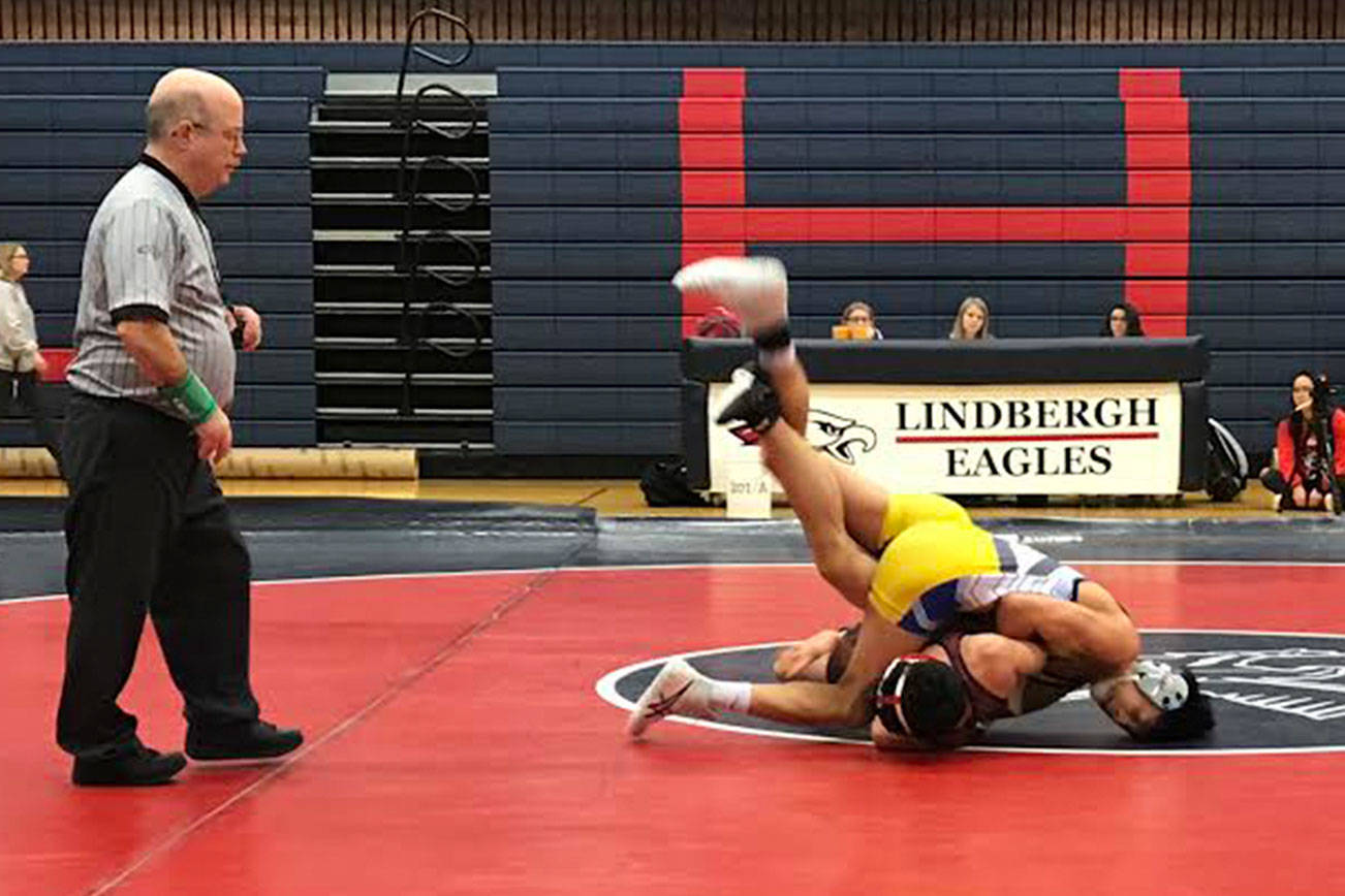 Quan Ly won by fall against his Lindbergh and Renton opponent’s at 138. Courtesy photos