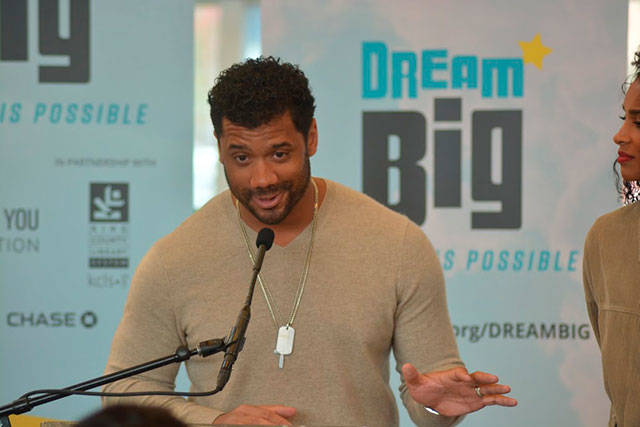 Russell Wilson and Ciara spoke Friday at the Tukwila Library to Foster students and other attendees as their Why Not You Foundation joined forces with the King County Library System and JPMorgan Chase to launch the DREAM BIG: Anything is Possible campaign. Photo by Kayse Angel
