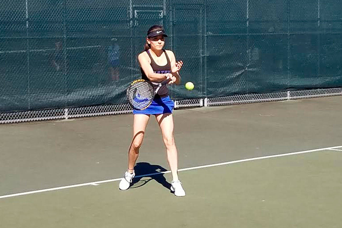 Marie Fenske (seen here) and her doubles partner Grace Kelly defeated Kent-Meridian’s Maya Frame andTina Trinh 6-4, 4-6, 6-4 Thursday. Courtesy photo from Hazen coach Gail Ellis