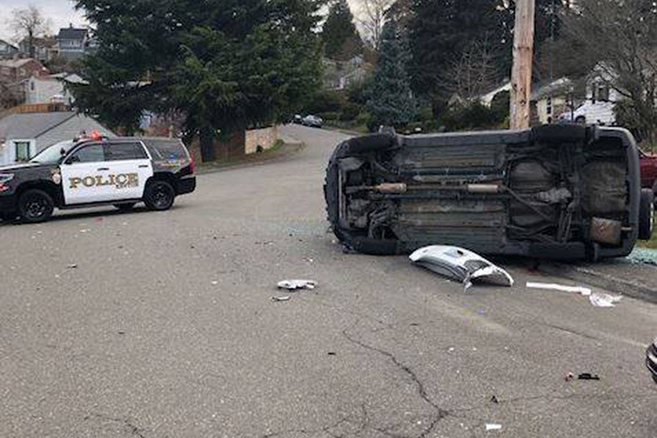 A vehicle driving erratically near Northeast 3rd and Bronson Way Northeast Thursday morning reportedly hit a vehicle backing out of their driveway and a parked car. Photos courtesy Renton Police Department’s Facebook