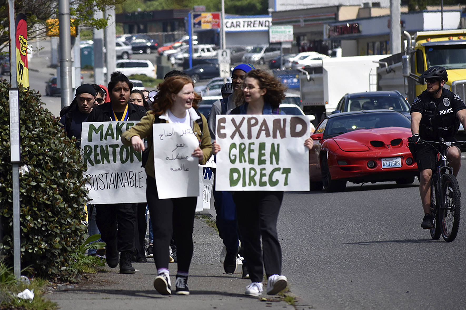 Photo By Haley Ausbun. About 20 Hazen High School students walked out of classes Friday, April 26, and marched to Renton City Hall to ask for sustainability and the fight against climate change locally.