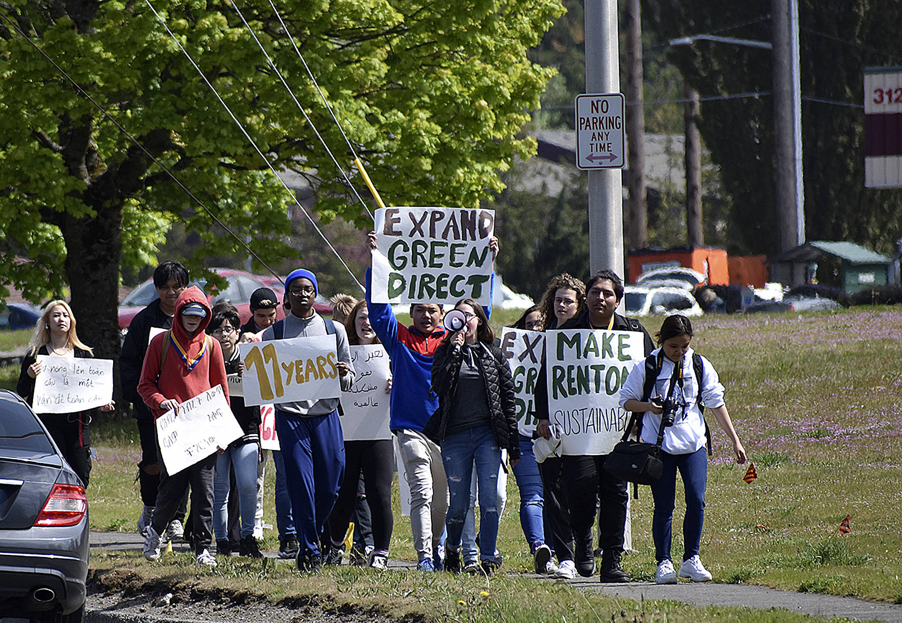 Photo By Haley Ausbun. About 20 Hazen High School students walked out of classes Friday, April 26, and marched to Renton City Hall to ask for sustainability and the fight against climate change locally.