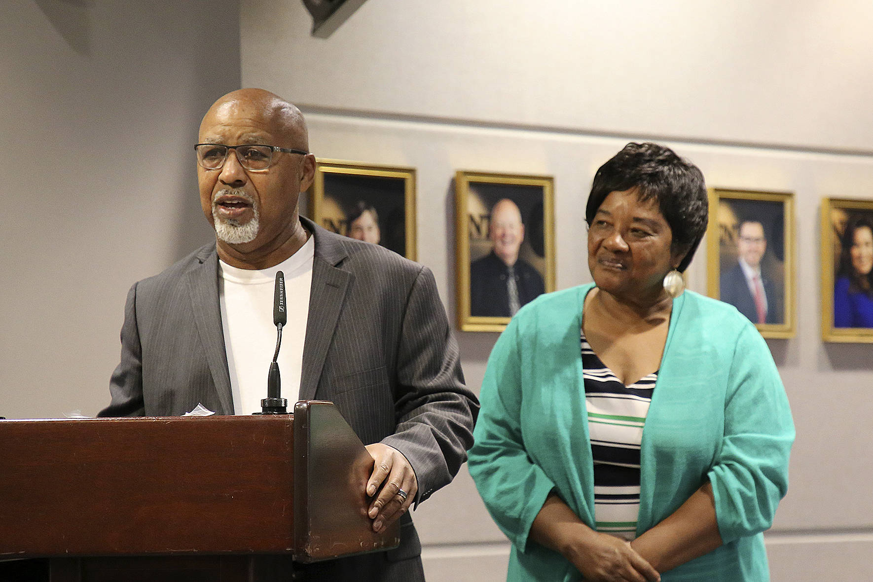 Courtesy of City of Renton. Reverend James Barnett of Still Waters Ministries and The Reverend Dr. Linda Smith of SKY Urban Empowerment Center accept the Juneteenth proclamation at the June 17, 2019, Renton City Council Meeting.