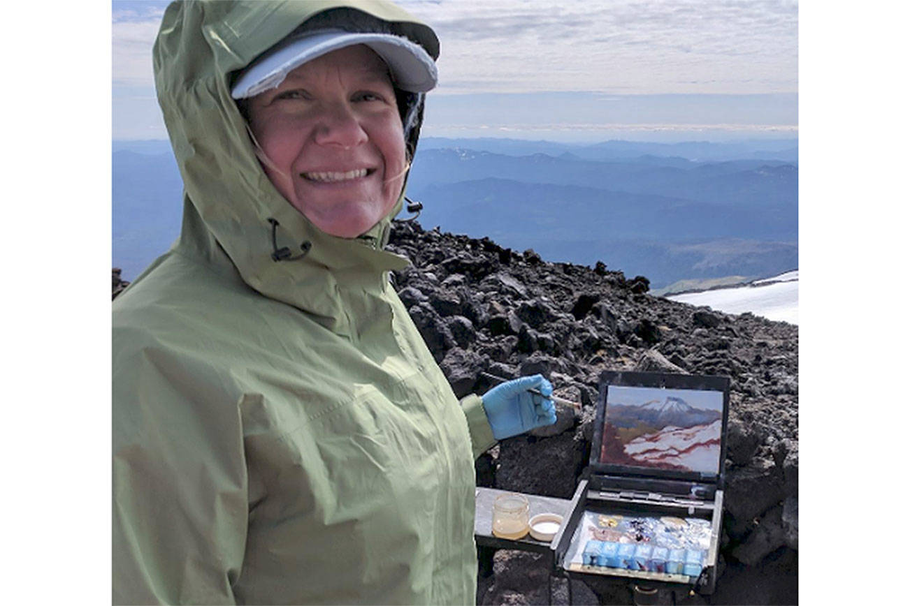 Courtesy photo                                Artist Britt Greenland climbed Mount Adams to paint.
