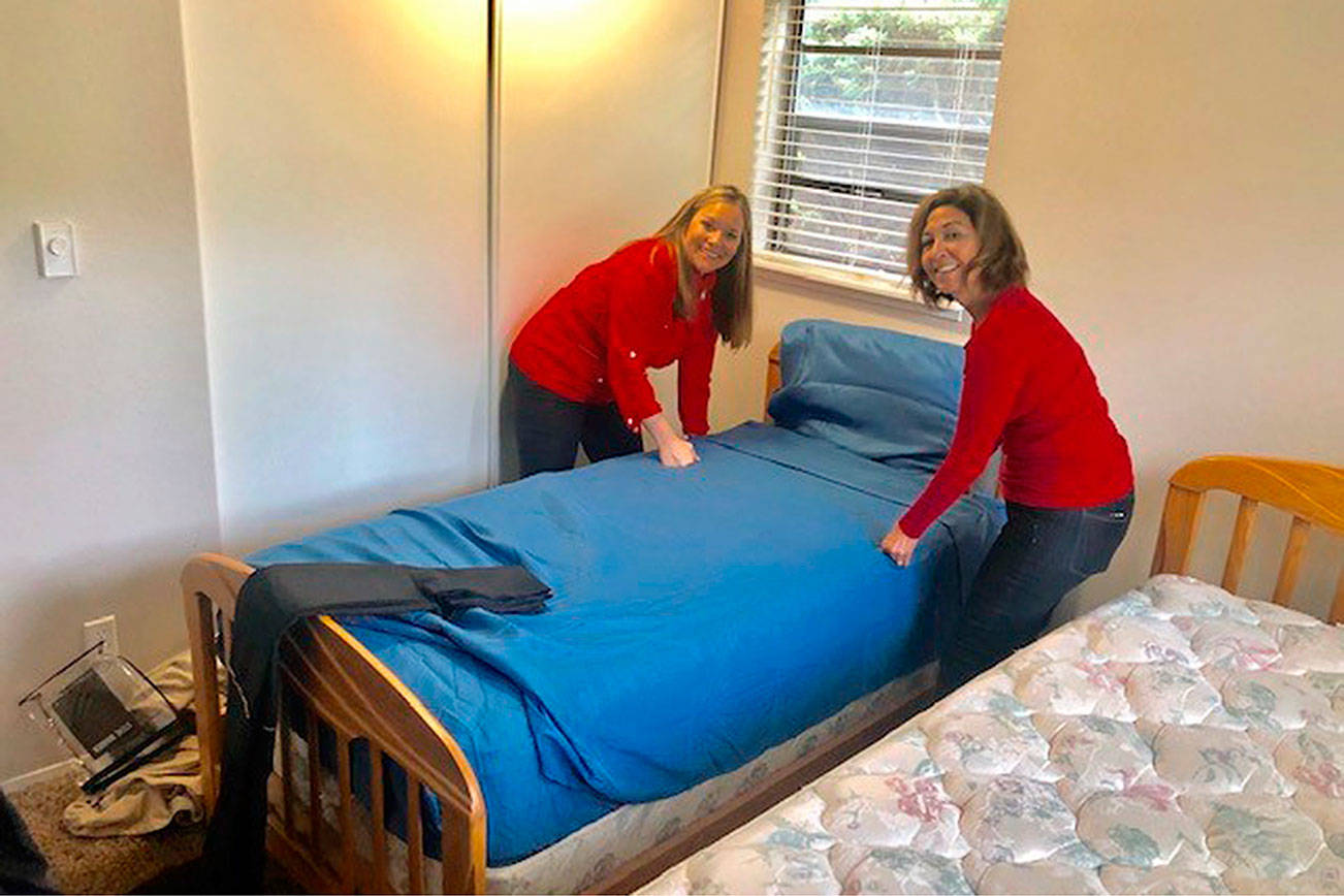 Courtesy of Mary’s Place. Volunteers from KeyBank’s Hispanic-Latino Impact Networking Group and Key Women’s Network gave a formerly homeless family “everything they would need to start fresh in a new apartment” through the Make-a-Home program.