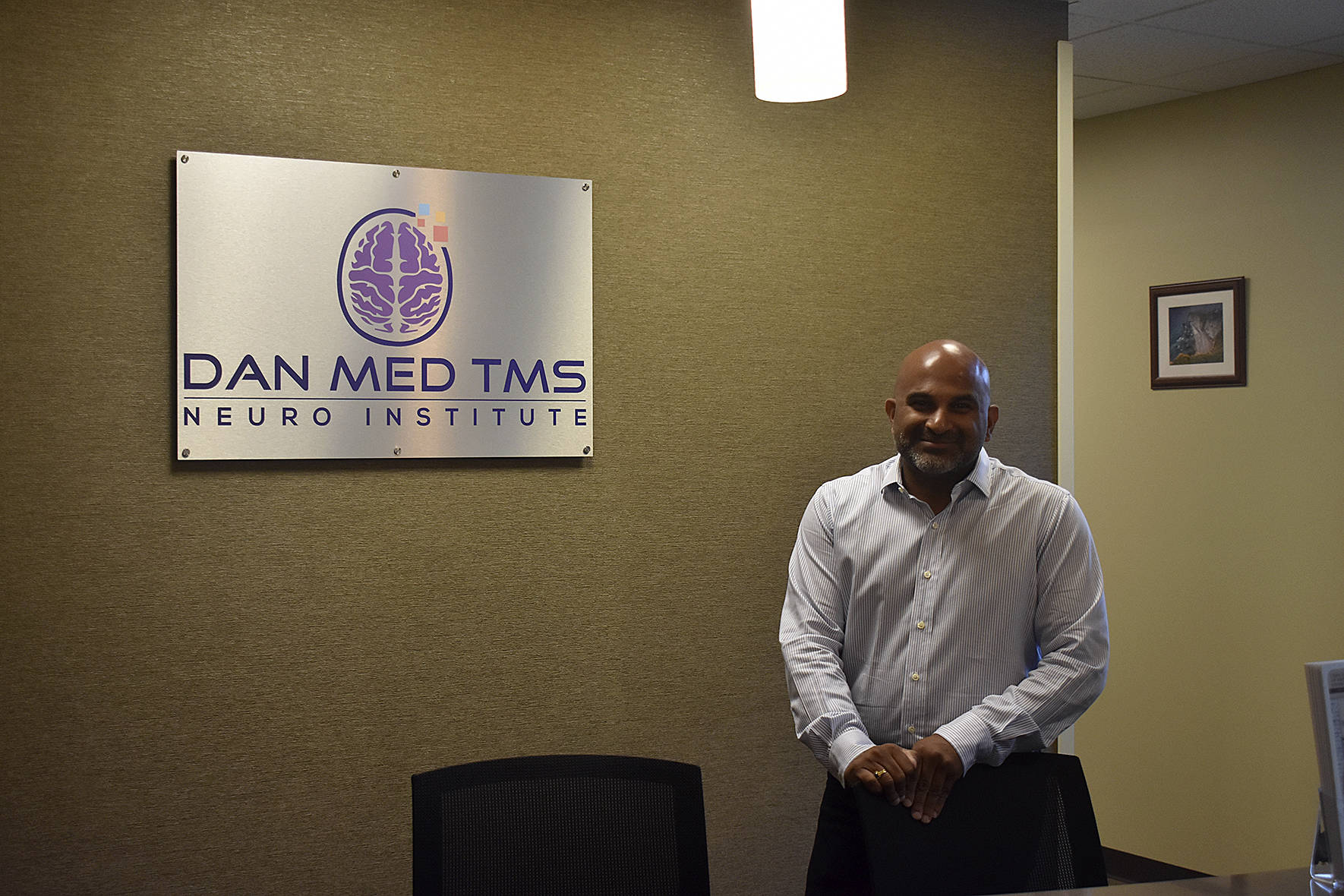 Photo by Haley Ausbun. Transcranial magnetic simulation (TMS) via Neurostar equipment is used to improve mental health, at a new Renton clinic from TMS national advocate Dr. Kalyan Dandala, pictured.