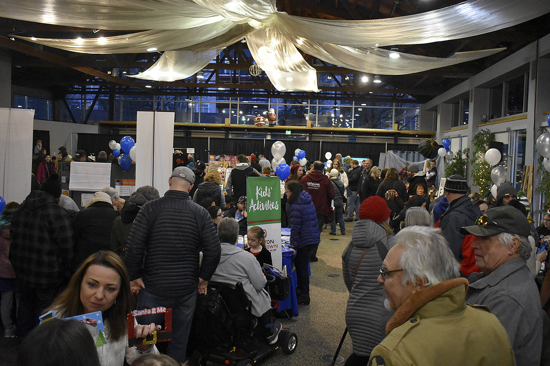 Photo by Haley Ausbun. A crowded pop-up market at the downtown tree lighting. Saturday, Nov. 30 at the Renton Pavilion Events Center.