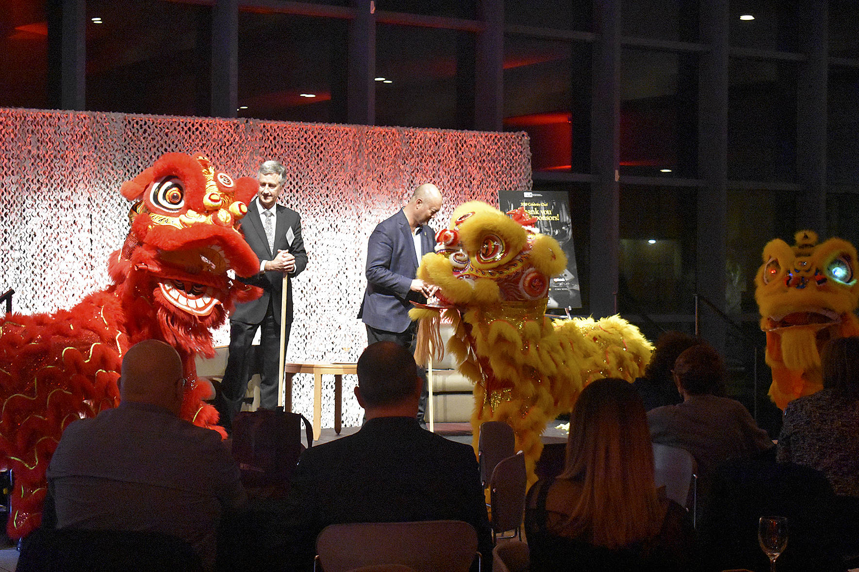 Photo by Haley Ausbun. The International Lion Dance & Martial Arts Team performed in honor of Lunar New Year at the event, Jan. 28 at Renton Technical College 2020 Celebrity Chef event. RTC President Kevin McCarthy and Advanced Sommelier Christopher Chan participated in the demonstration, offering heads of lettuce to the lions. The Lion Dance is meant to bring good luck.