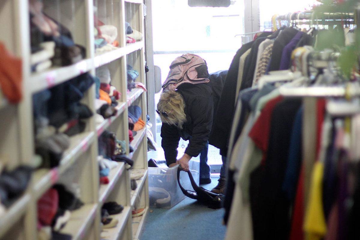 A client searches for clothing at the Kiwanis Clothing Bank location in 2016. Leah Abraham/File photo