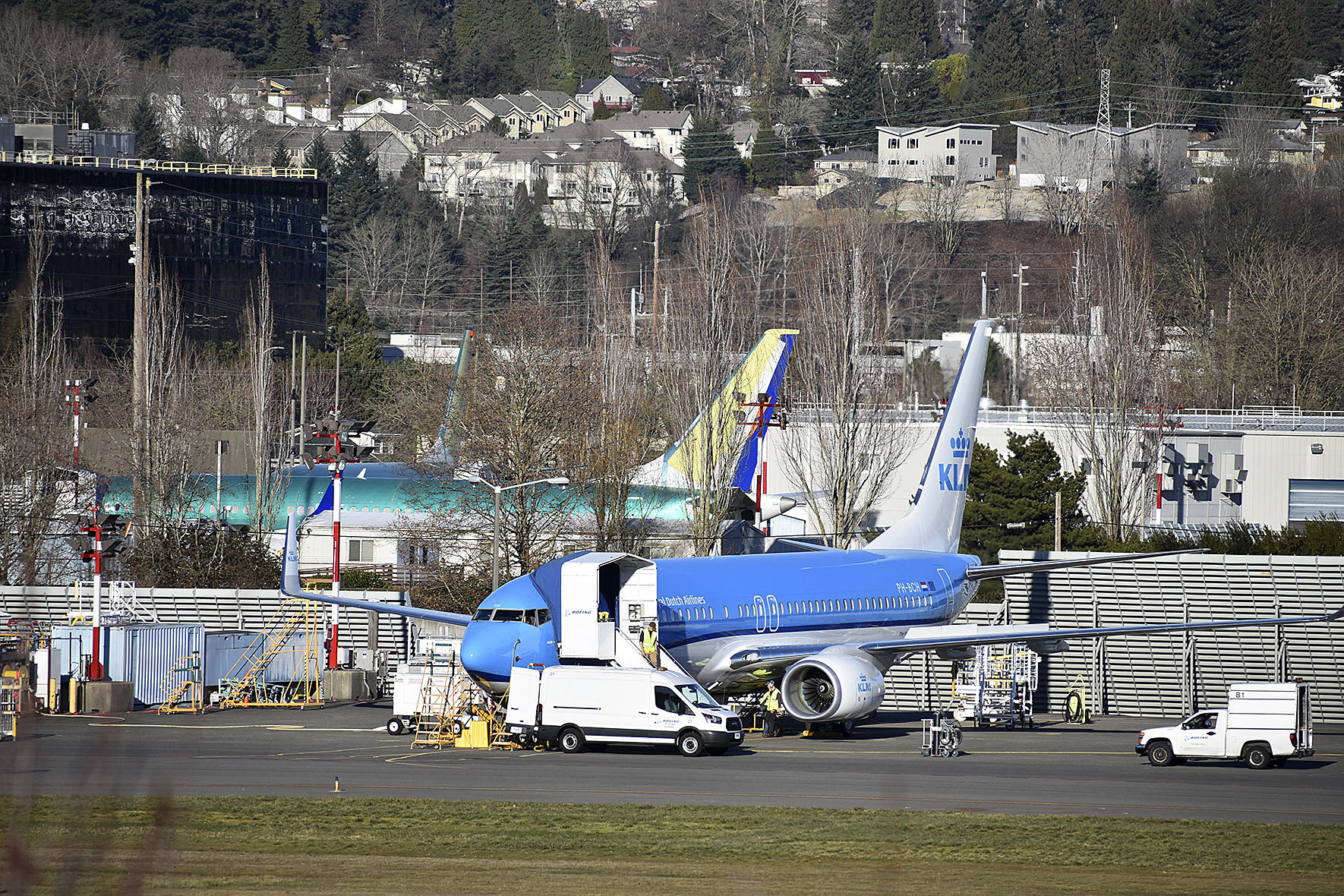 Photo by Haley Ausbun. Boeing employees check on some of the parked MAX planes at the Renton plant where they are assembled, Spring 2019.