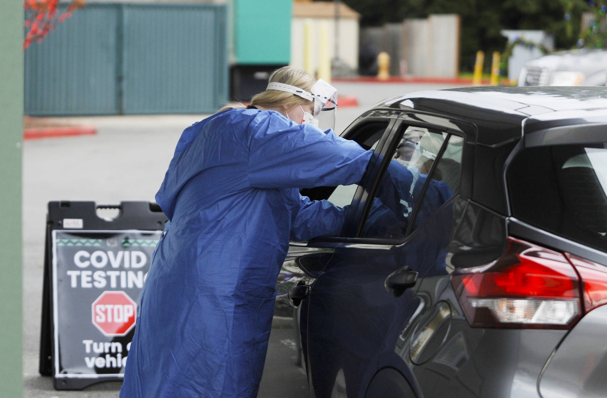 Licensed practical nurse administers a COVID-19 test at the Jamestown Family Clinic’s drive-up testing site on Dec. 7. Sequim Gazette photo by Michael Dashiell