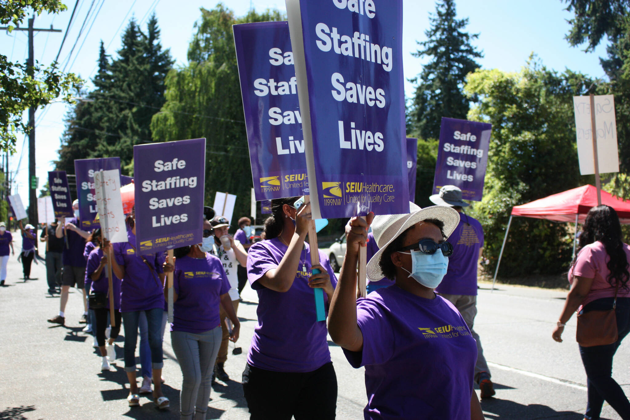 SEIU Healthcare 1199NW union workers hold a safety strike Aug. 11 after a violent patient left 11 employees injured. Photo by Cameron Sheppard/Sound Publishing.