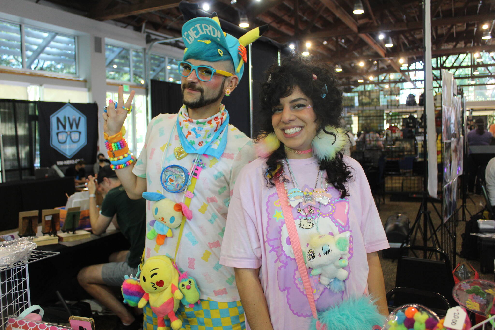 Colin Aceves, a special guest at Renton City Retro, and Lena Osuna pose at their kawaii and anime-inspired booth. Photo by Bailey Jo Josie/Sound Publishing.