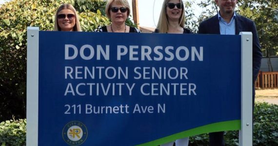 Renton Mayor Armondo Pavone takes photo with members of Don Persson’s family. (Courtesy of City of Renton)
