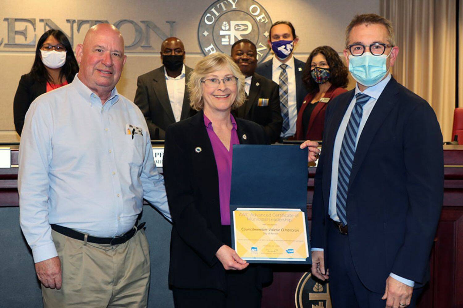 Renton City Councilmember Valerie O’Halloran (middle) being awarded an Advanced Certificate of Municipal Leadership from the Association of Washington Cities (Courtesy of City of Renton)